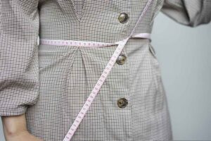 Woman Measuring Waist